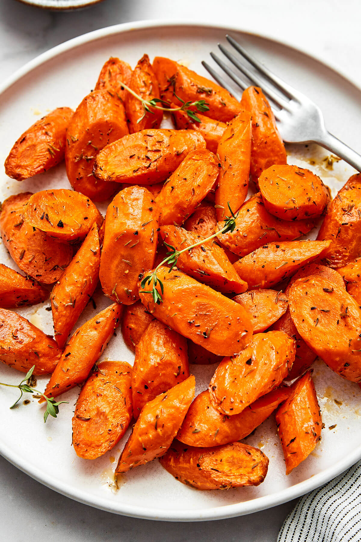 Air fryer carrots on a white plate