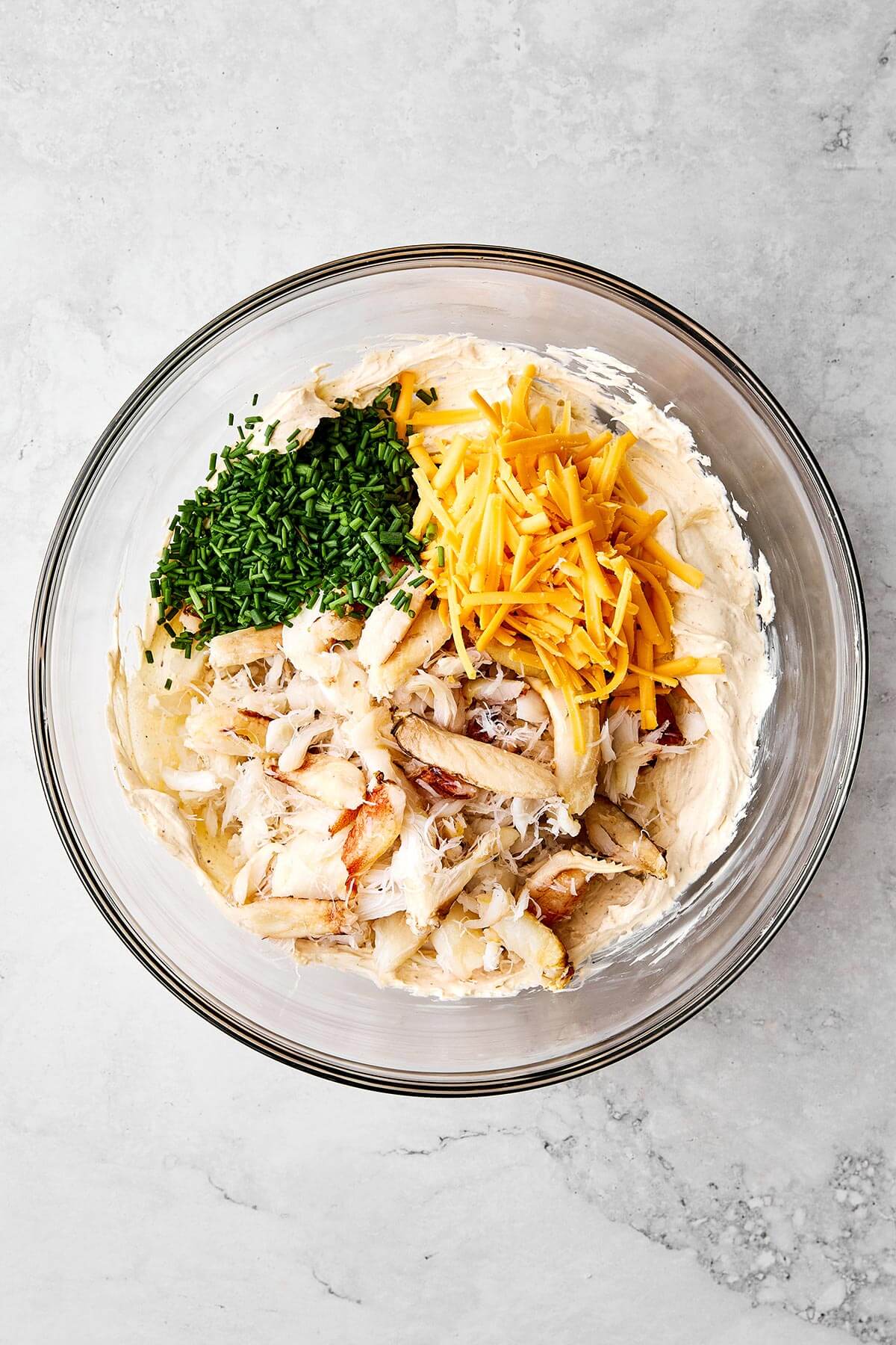 Crab dip ingredients in a bowl.