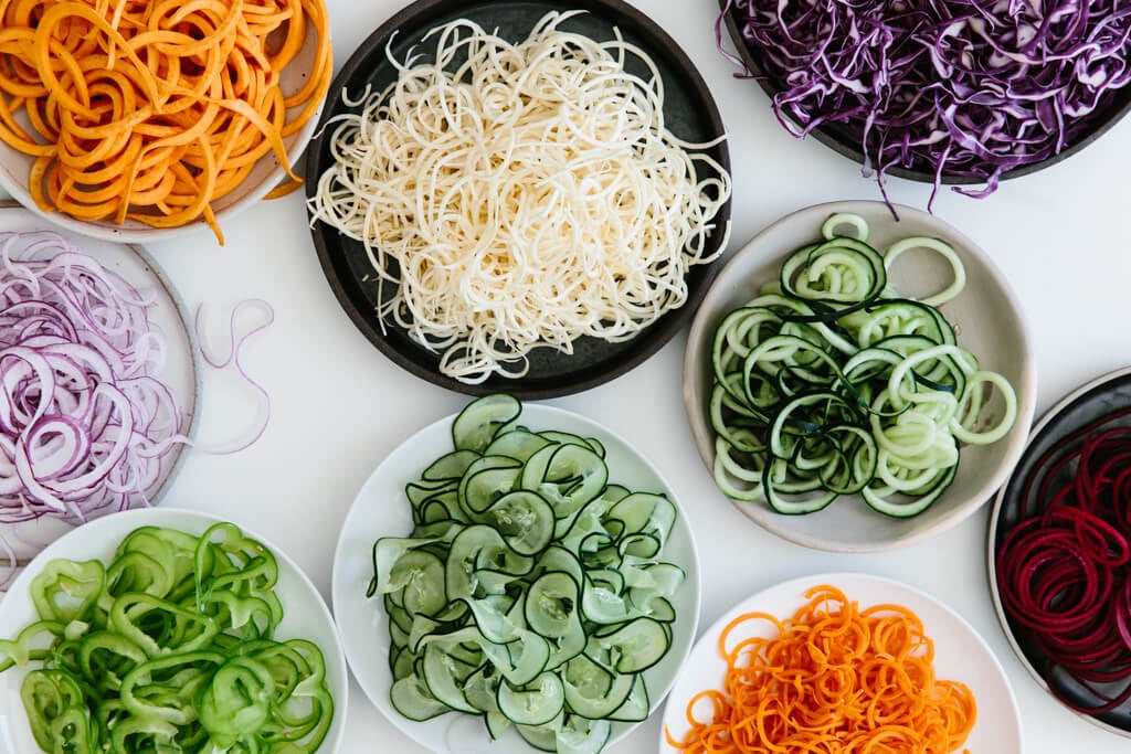 The spiralizer is one of my favorite kitchen tools. So today I'm sharing my favorite vegetables to spiralize along with veggie spiralizer tips and recipes. Learn how to spiralize - it's easy! 