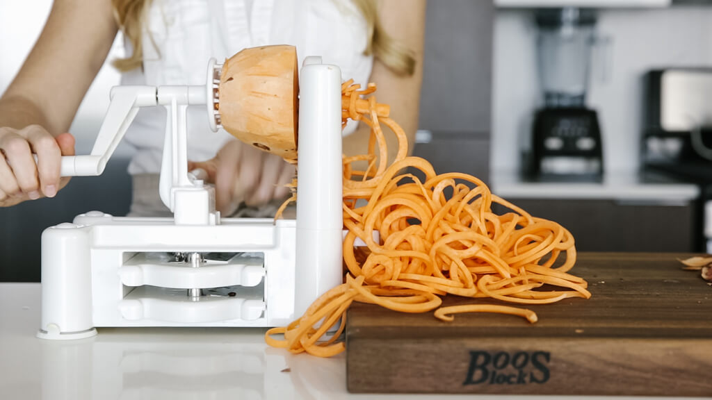 The spiralizer is one of my favorite kitchen tools. So today I'm sharing my favorite vegetables to spiralize along with veggie spiralizer tips and recipes. Learn how to spiralize sweet potato.
