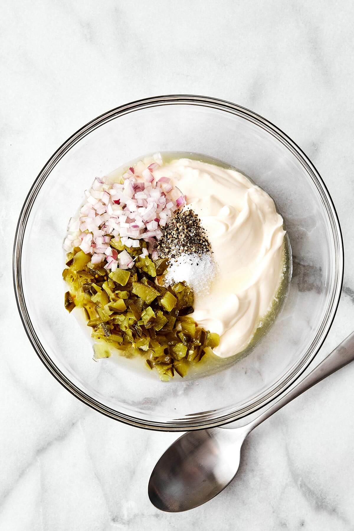 Tartar sauce ingredients in a bowl.
