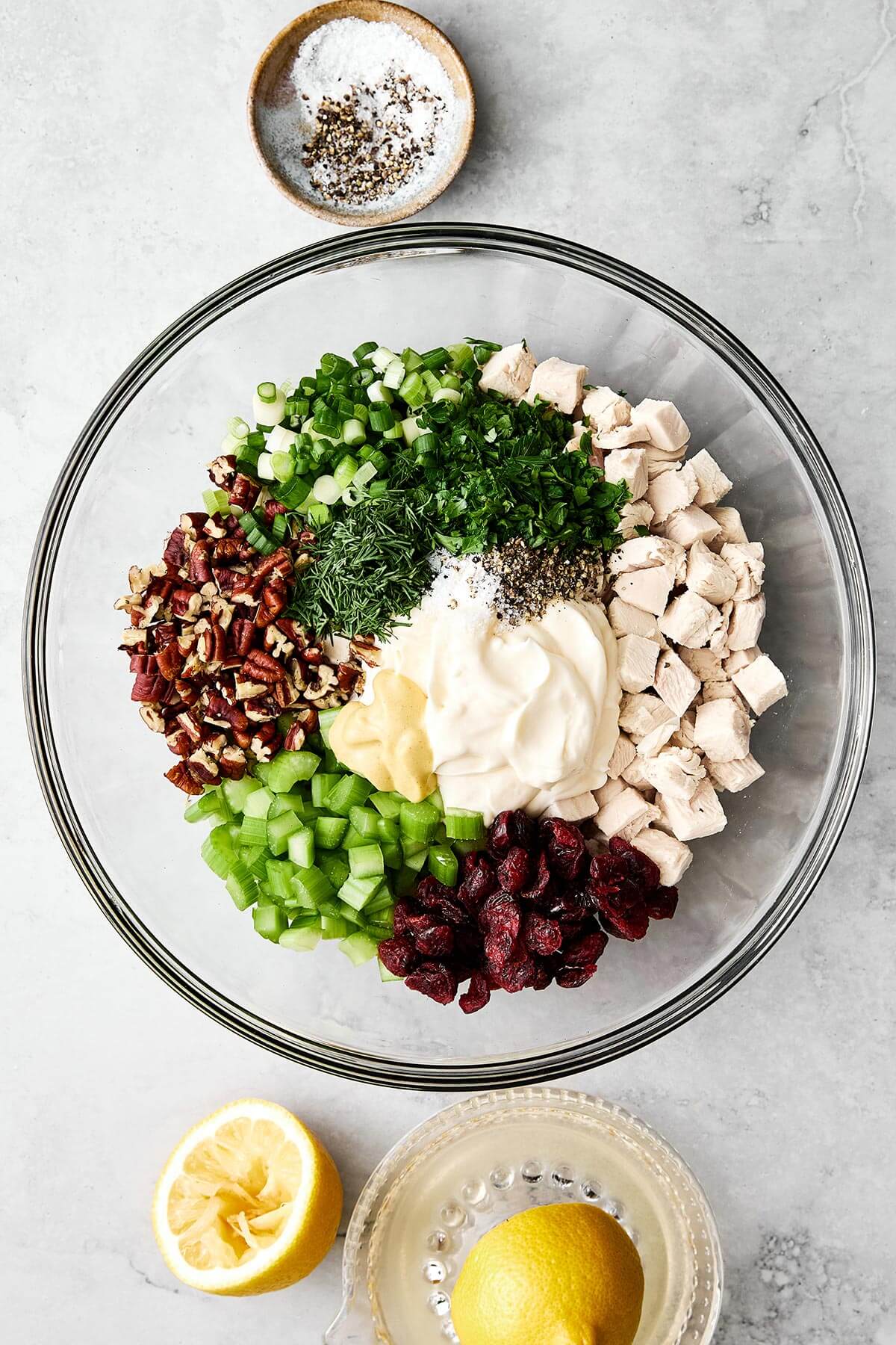 A bowl of turkey salad ingredients.