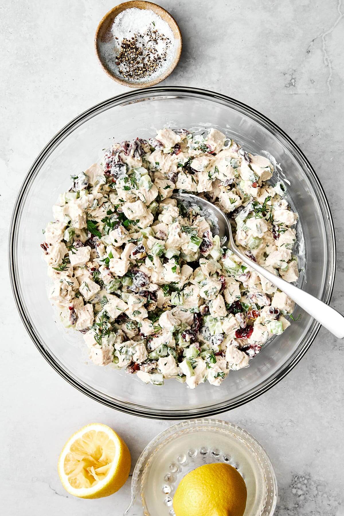 Mixed turkey salad in a glass bowl.