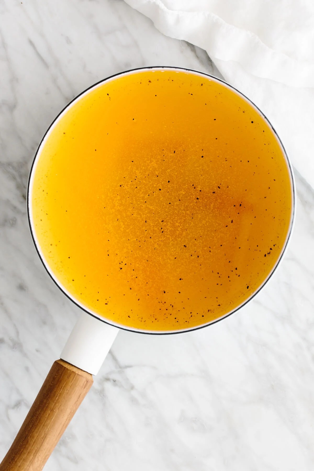 Turmeric tea ingredients in a pot.